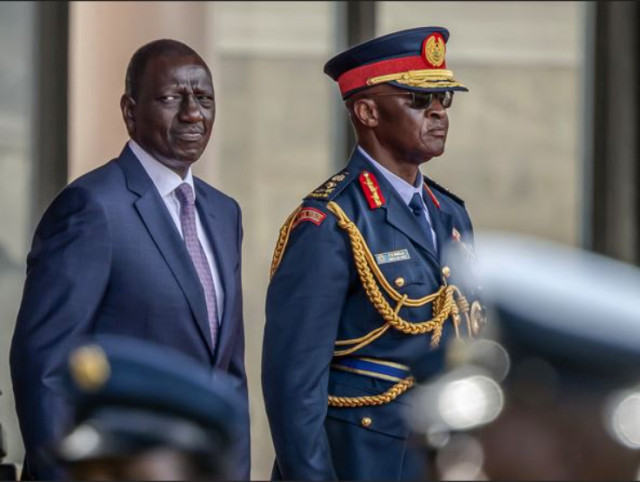 President of Kenya, William Ruto (L) and Chief of Kenya Defence Forces General, Francis Ogolla(R) look on while inspecting a guard of honour by the members of Kenya Defence Forces during official visit to State House in Nairobi